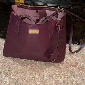 Kate Spade Burgundy Nelle Putnam Drive 
Damaged handle but strap included